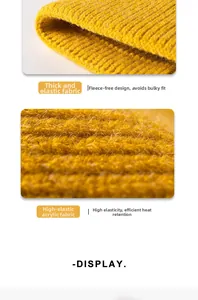 Detailed macro view showing the thick elastic rib knit texture of this bright yellow beanie