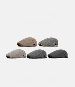 British style newsboy caps in five colors with woven texture and metal side buckles