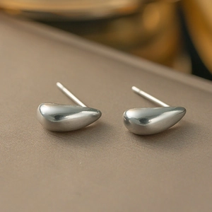 Minimalist silver geometric teardrop earrings with high-polished metallic finish for women