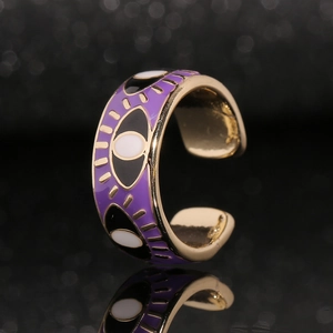 Golden evil eye open ring with purple enamel finish and polished surface on dark mirror