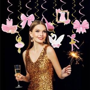Pink and gold ballet themed birthday party hanging swirls with tutu and swan decorations