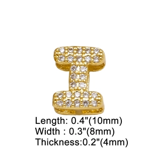 Detailed view of gold letter I pendant with micro-pave crystals measuring 10x8x4mm