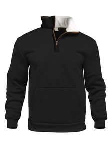 Detail of waffle knit sweatshirt showing quarter zip, stand collar, and white fleece lining