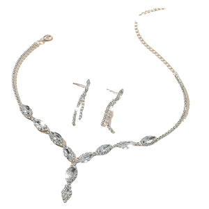 Detailed close-up of sparkling crystal bridal jewelry set in polished silver finish