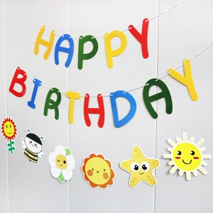 Colorful Happy Birthday paper banner with daisy and bee cutouts for party decor