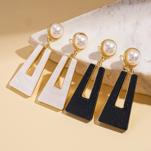 Elegant acrylic faux pearl square hollow earrings in black and white with gold accents