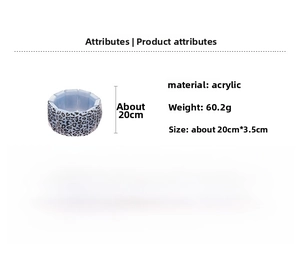Detail view of a geometric acrylic bracelet featuring leopard print and blue marble textures