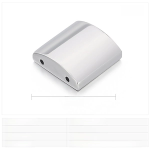 Close-up of polished stainless steel curved rectangular geometric charm with dual holes