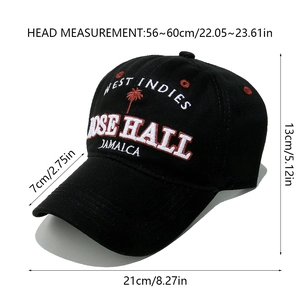 Detailed view of West Indies embroidery and red palm tree on a black baseball cap