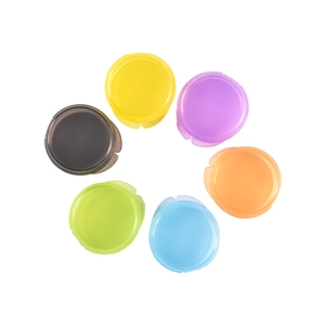 Lot de six piluliers ronds colorés en jaune, violet, orange, bleu, vert et gris anthracite