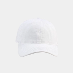 Close-up detail of high-density twill cotton fabric and stitching on a white baseball cap