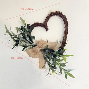 Detailed view of heart-shaped olive leaf wreath with 32cm width and 50cm height dimensions