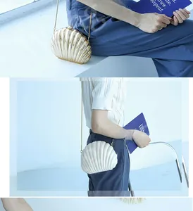 Detailed view of acrylic shell clutches in gold and cream white with metallic chain straps