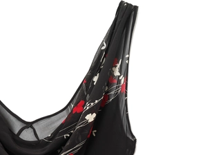Détail du col en V profond et de la couture florale sur robe en mousseline de soie