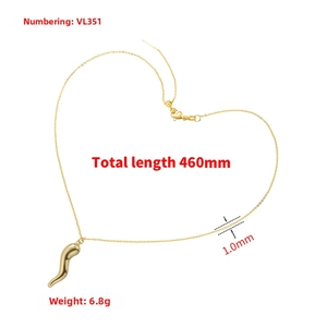 Close-up of 18K gold plated S-shaped chili pendant necklace with shiny zircon on white background