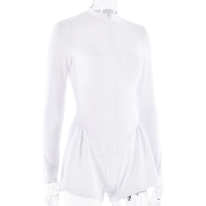Detailed close-up of white long sleeve romper with front zipper and stand collar
