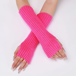Detailed texture of neon pink ribbed knit arm warmers with a fingerless design