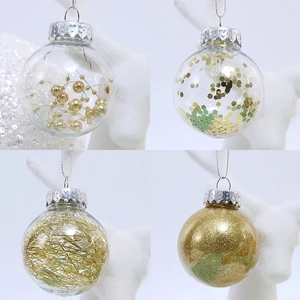 Set of 24 transparent Christmas balls with gold sequins and festive fillings for trees