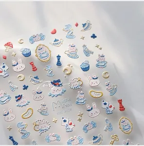 Macro detail of 5D blue rabbit embossed nail art stickers with fairytale motifs