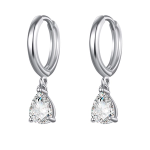 Detail of silver drop earrings featuring pear-cut cubic zirconia and snap closure