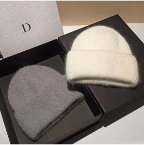 Close-up of premium rabbit hair knit beanie showing the soft fuzzy texture and ribbed cuff