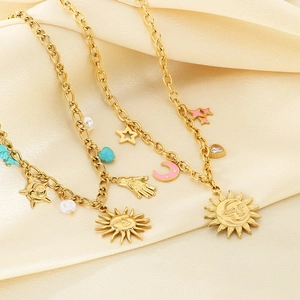 Retro 18K gold-plated stainless steel chain necklace set with celestial pendants on satin