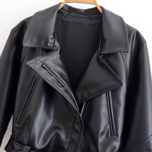 Women's black PU leather jacket with large lapels and zipper pockets in biker style