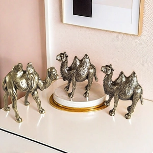 Three vintage bronze camel figurines set for desert landscape and home desktop decor