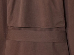Detailed macro view of brown twill fabric texture and pocket stitching quality
