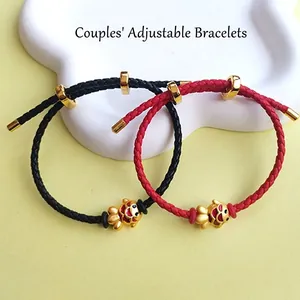 Adjustable couple cord bracelets with gold enamel lucky cat charms in red and black