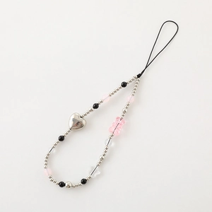 Y2K beaded phone charm with pink bear bead and silver heart pendant on white background