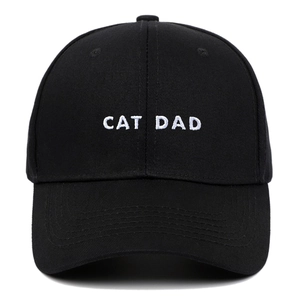 Classic black baseball cap with white CAT DAD embroidery on premium cotton fabric