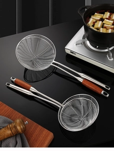 Detail of 304 stainless steel mesh strainers with heat-resistant wooden handles