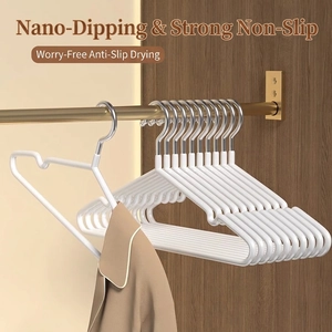 Pack of 10 white non-slip nano-dipped clothes hangers with silver metal hooks for home