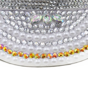 White bridal captain hat with luxury pearls, rhinestones and iridescent gemstones