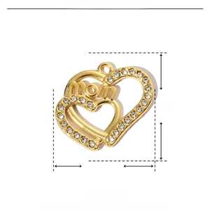 Detailed view of a gold mom heart pendant with rhinestones and precise size measurements