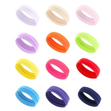 Grid view showing 12 different colors of African print elastic sports headbands for women