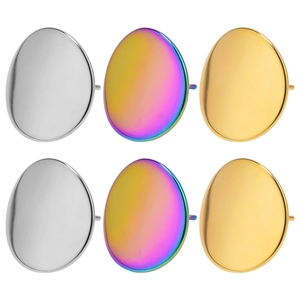 Detailed view of polished oval earrings in silver, gold, and iridescent rainbow finishes