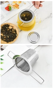 Macro detail of 304 stainless steel tea infuser with folding handles and lid