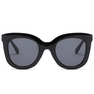 Women's trendy round cat-eye oversized sunglasses with black frames and dark grey lenses