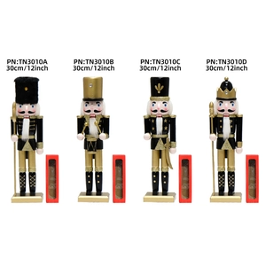 Set of four 30cm black and gold wooden nutcracker king figures with red gift boxes