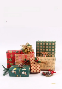 Detailed view of various Christmas wrapping papers with vintage kraft and festive patterns