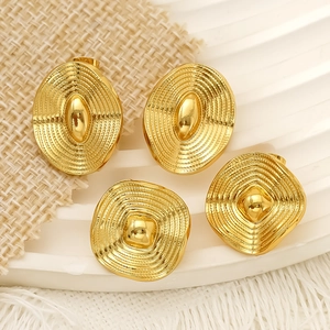 Vintage gold titanium steel earrings with embossed concentric circles in round and oval shapes