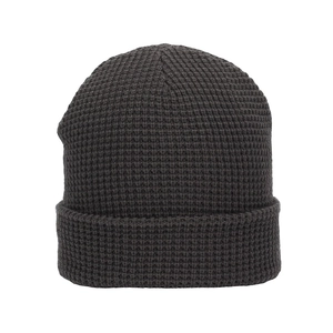Macro detail of dark grey waffle knit pattern and folded cuff on the warm winter beanie