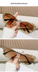 Detailed view of luxury cat-eye sunglasses with gold metal frame and rhinestone inlay