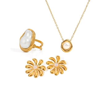 Golden stainless steel jewelry set featuring pearl ring, flower earrings and necklace