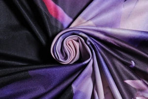 Detailed view of the digital print fabric with soft drape and purple abstract patterns