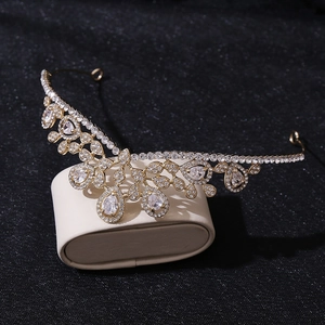 Detail of a bridal tiara featuring drop-shaped zircons and intricate leaf patterns