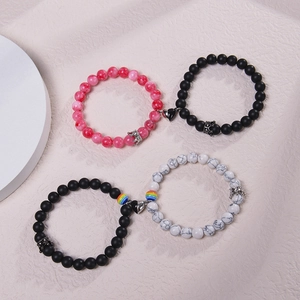 Magnetic crown couple bracelets featuring white turquoise, matte stone, and heart charm