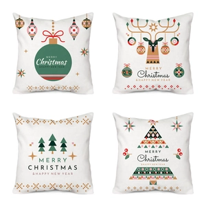 Set of four Christmas pillow covers with reindeer and snowflake prints in a 2x2 grid view